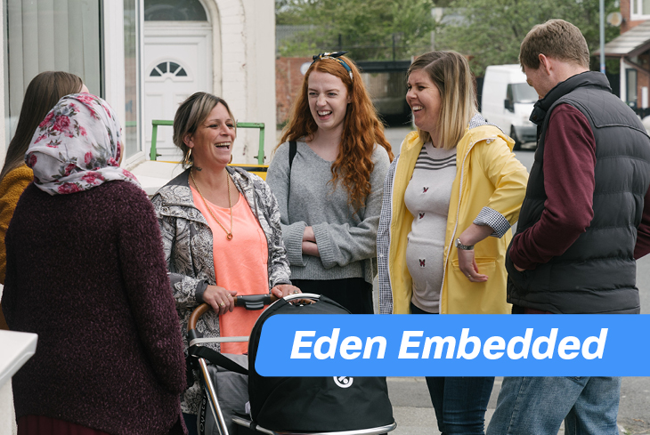 Eden team chatting on street