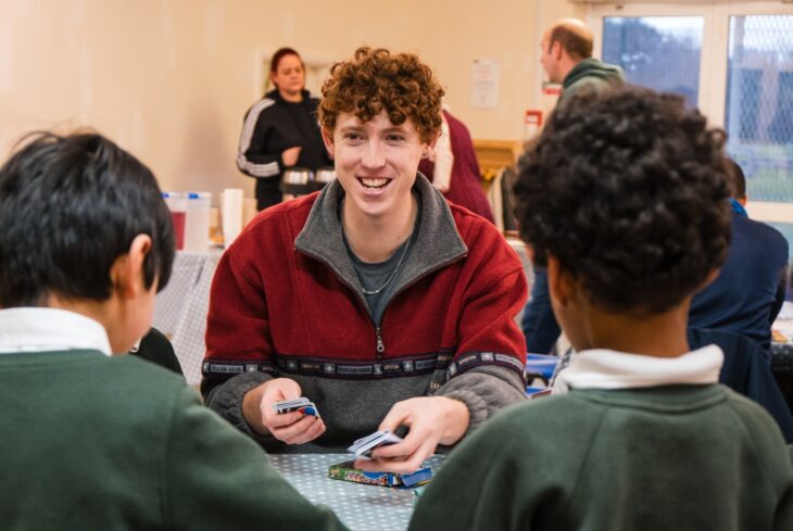 Children playing UNO game at Eden Gurnell Grove