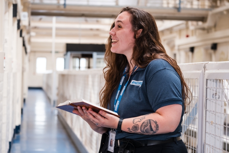 Prisons worker sharing the Bible in prison