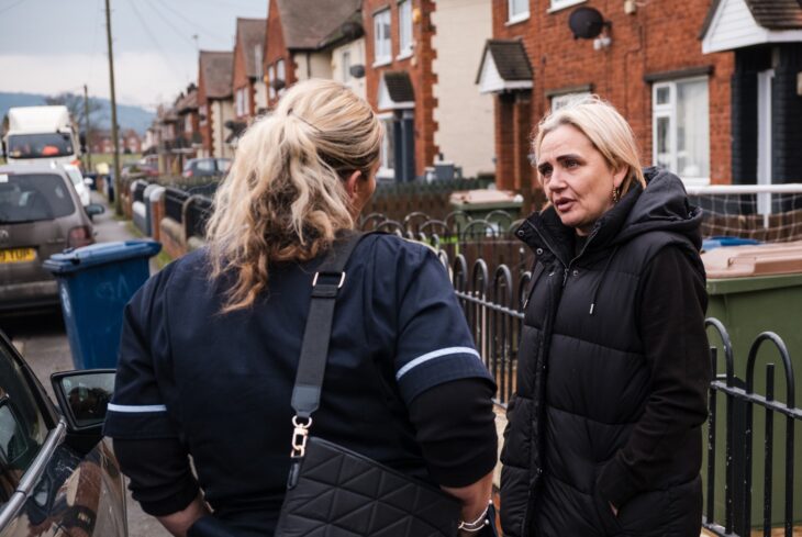 Kelly from Eden South Bank chatting to a neighbour on the street