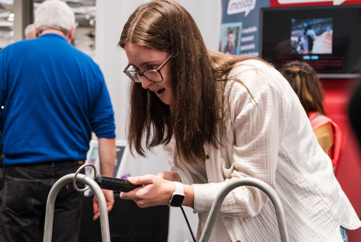 Young person playing a game at a WILD event