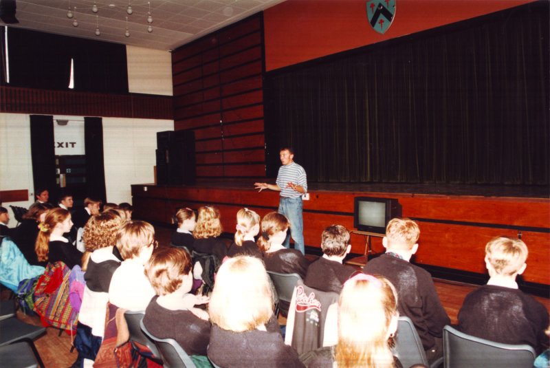 Old photo of The Message leading a session in a school