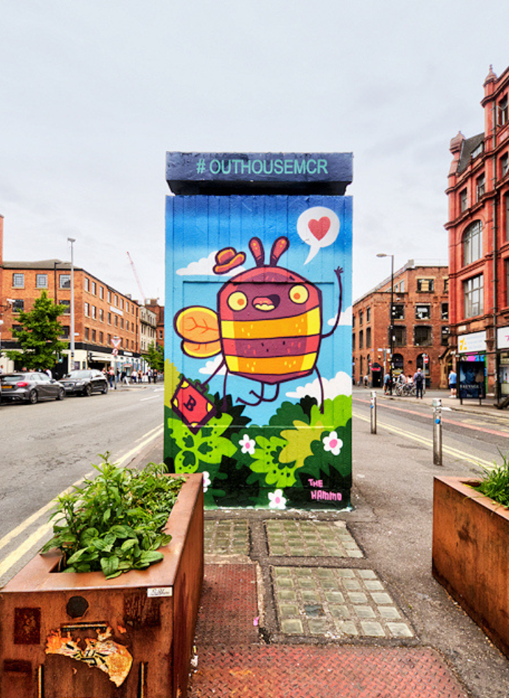 A mural of a cartoon bee in the Norther Quarter.