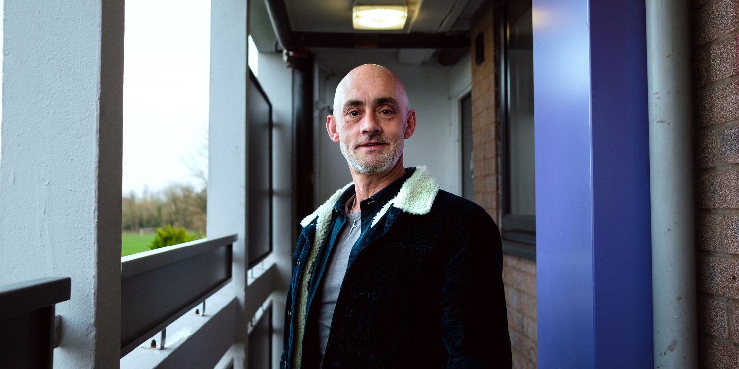 Bobby smiles for the camera as part of a profile on his journey to faith from prison.